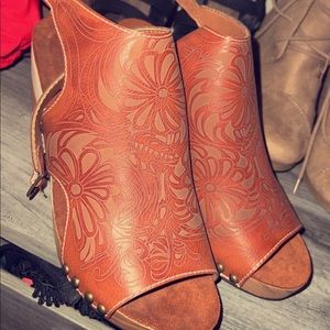 Super cute western wedges. Never been worn!